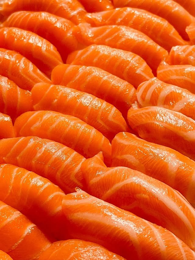 Premium fresh salmon sashimi slices for New York sushi catering