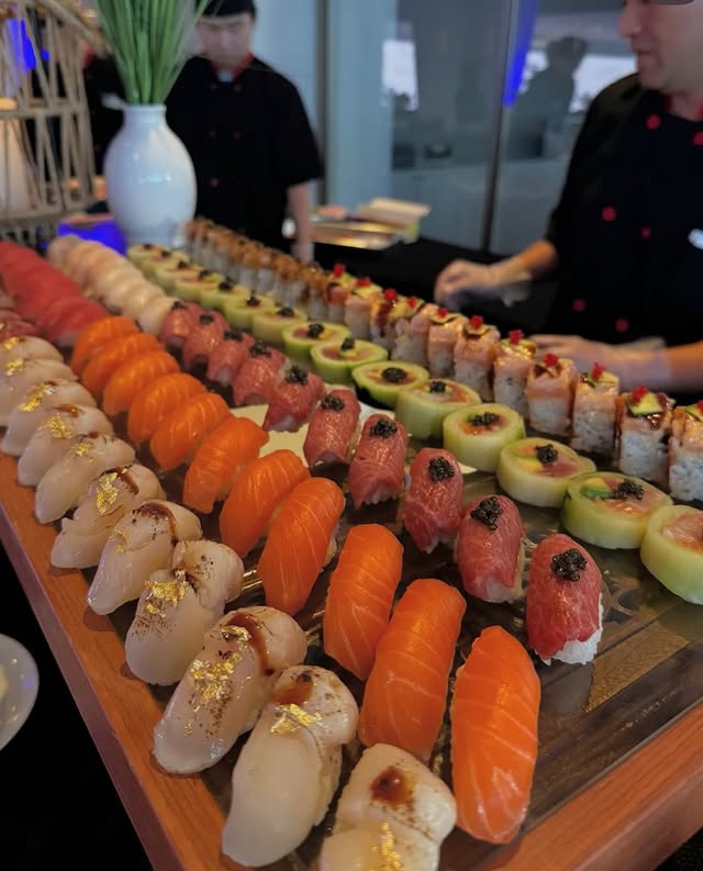 Omakase-style sushi catering with premium nigiri lineup prepared by NYC sushi chef