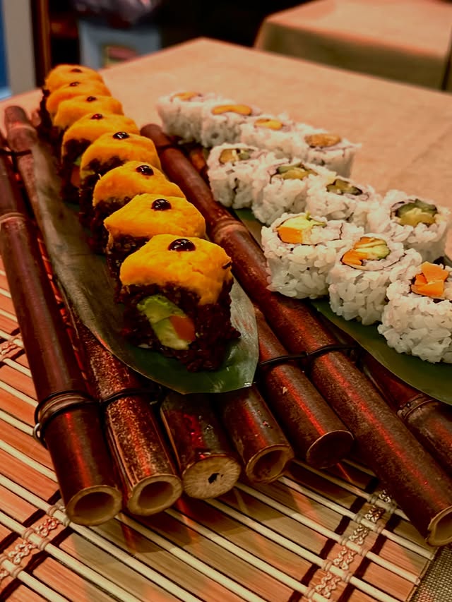 Traditional bamboo platter with assorted sushi rolls and nigiri for NYC catering