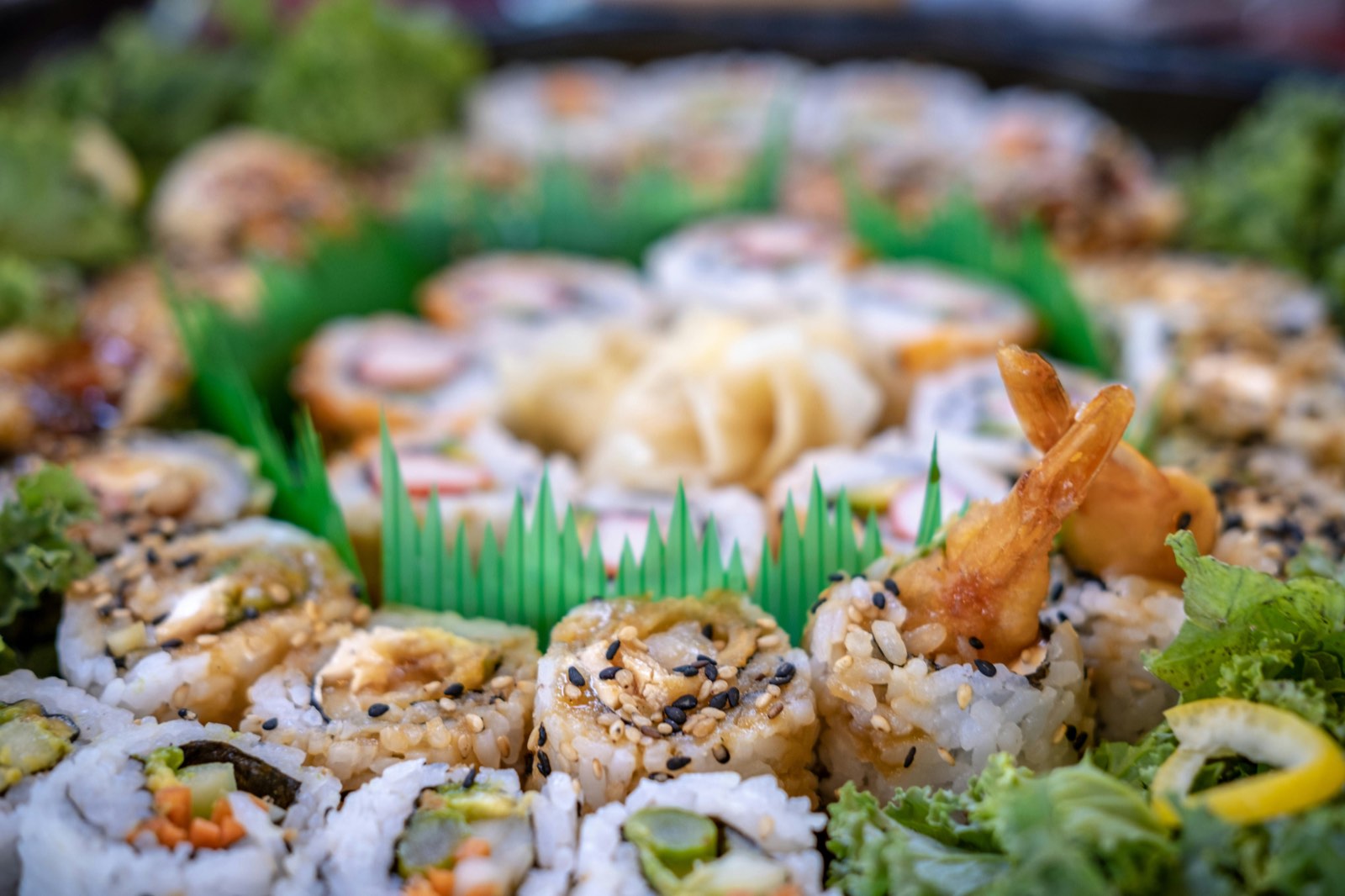 Closeup of freshly made sushi rolls with premium ingredients at a corporate catering event in NYC