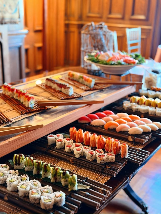 Elegant wedding sushi catering spread with assorted rolls and nigiri in NYC venue